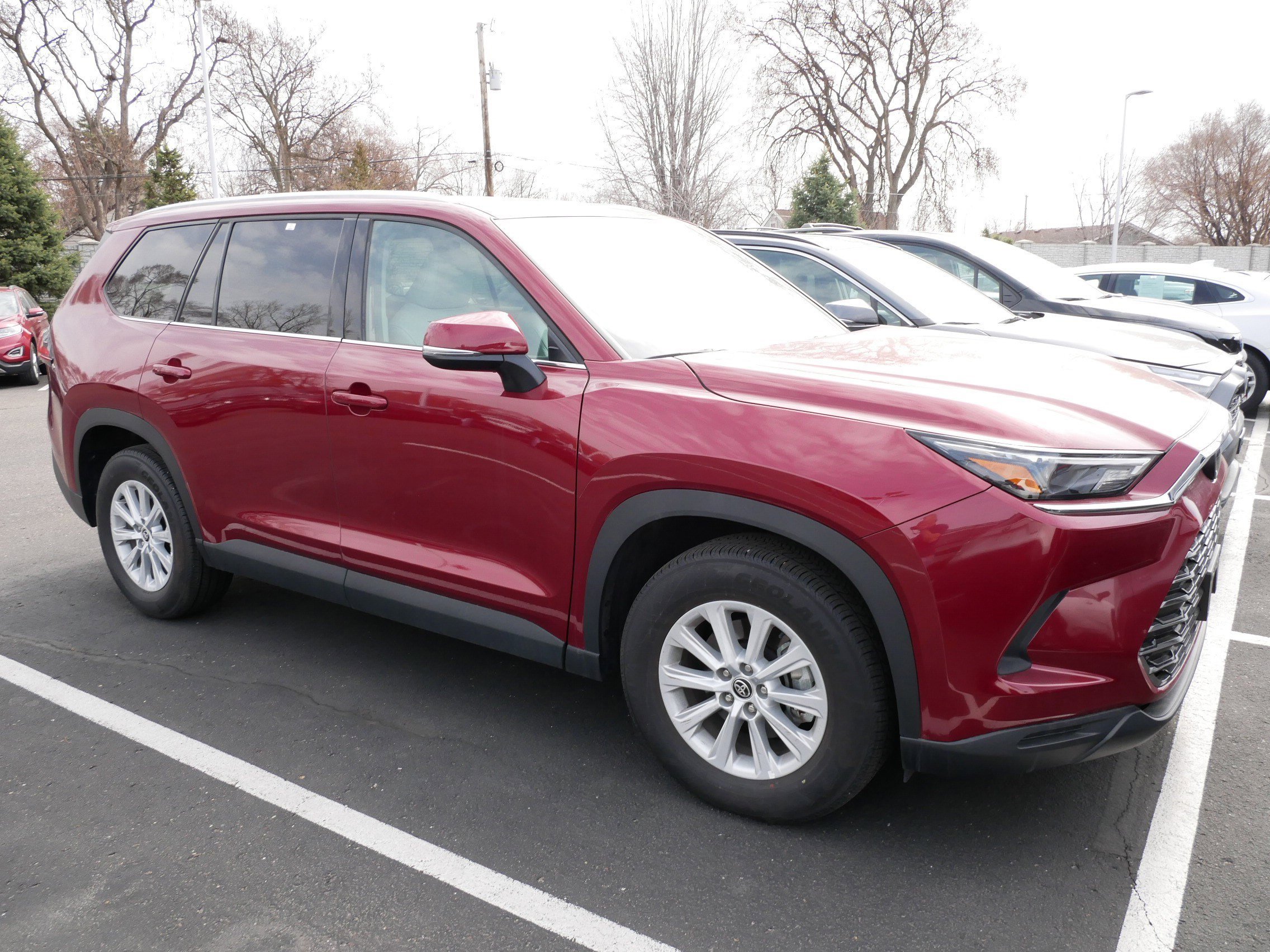 Used 2024 Toyota Grand Highlander XLE with VIN 5TDAAAB52RS059710 for sale in Brooklyn Center, Minnesota