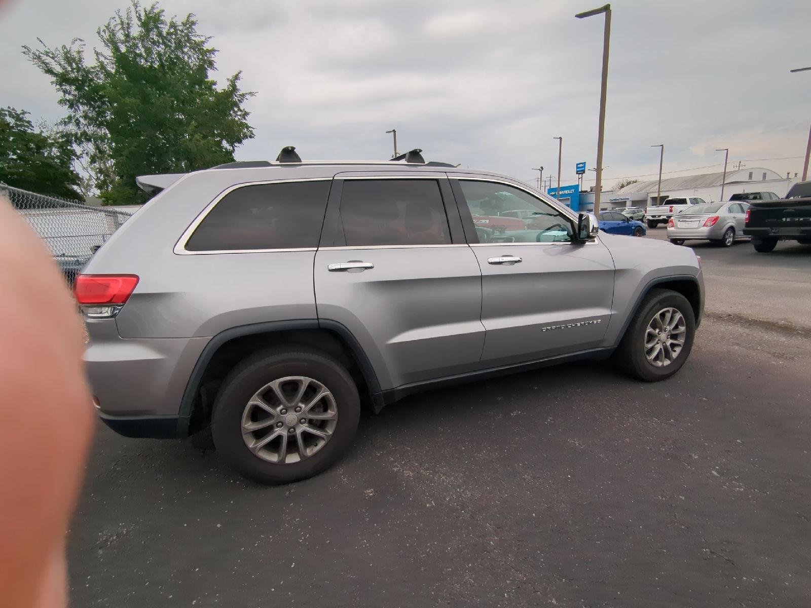 Used 2014 Billet Silver Metallic Clearcoat Jeep Limited image 8