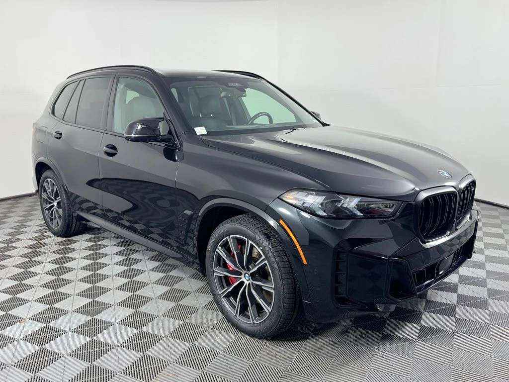 Certified Used 2024 Black Sapphire Metallic BMW M60i image 3