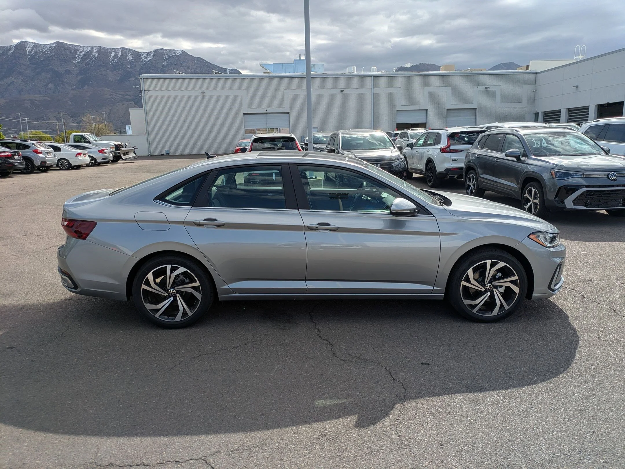 New 2026 Pyrite Silver Metallic Volkswagen SEL image 2