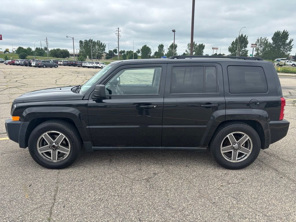 Used 2010 Black Jeep Sport image 4
