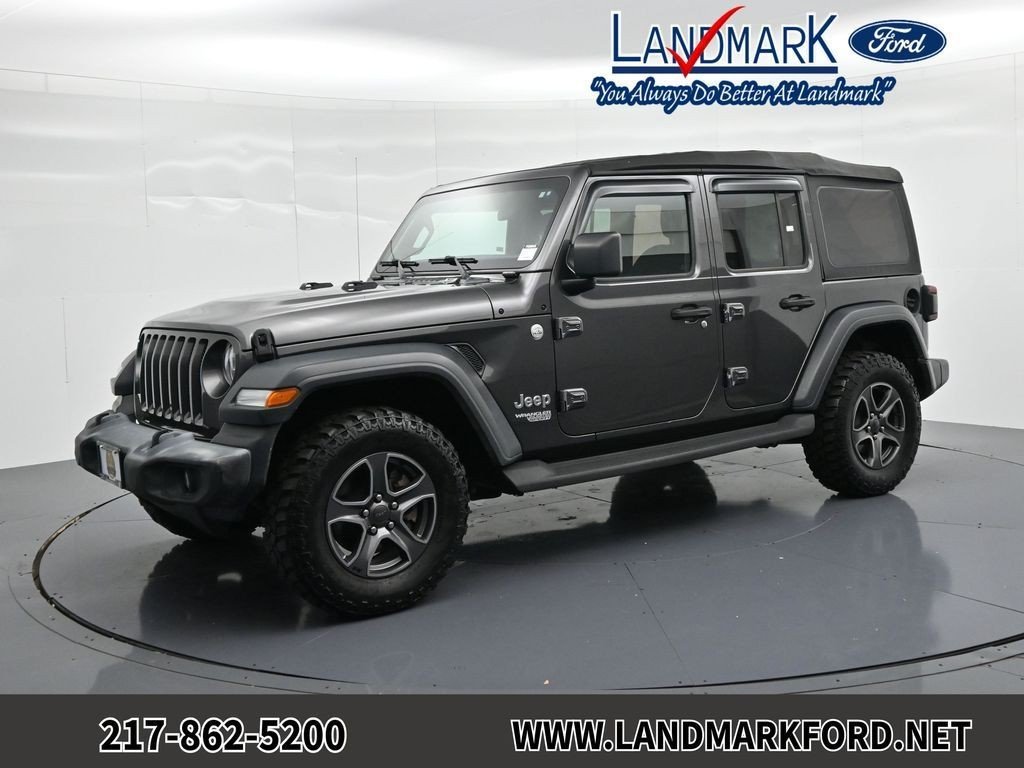 Used 2018 Crystal Metallic Jeep Unlimited Sport S image 1