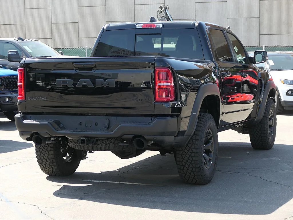 New 2026 Diamond Black Crystal Pearl Coat RAM RHO Crew Cab 4x4 5