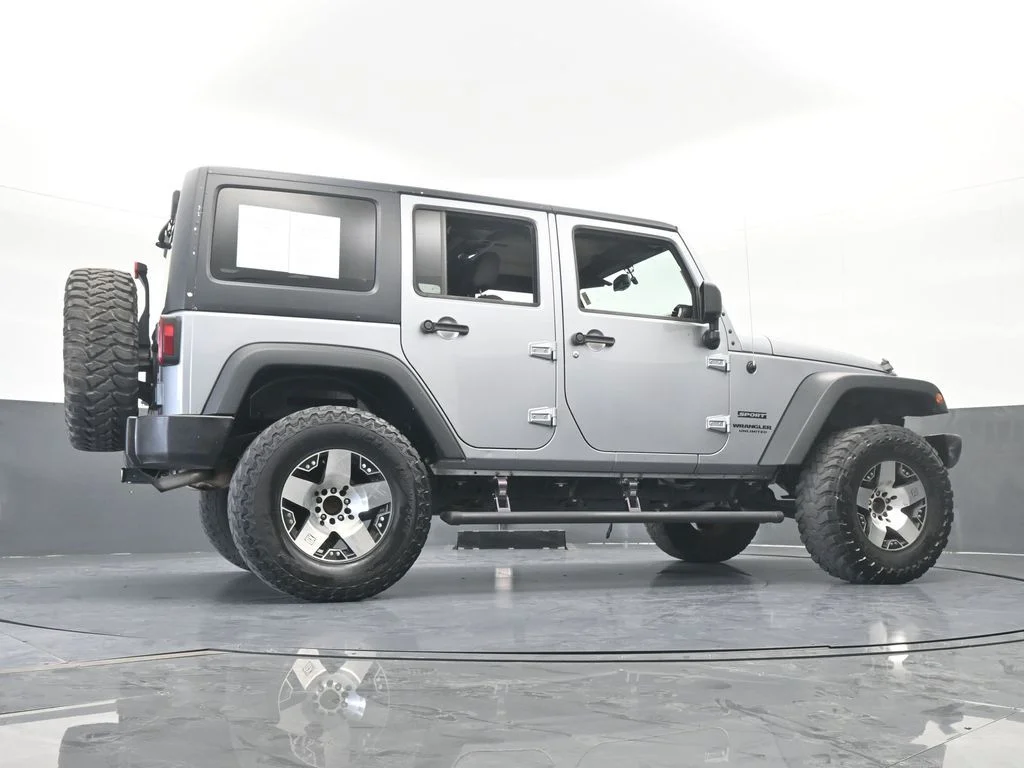 Used 2016 Billet Silver Metallic Clearcoat Jeep Unlimited Sport image 51