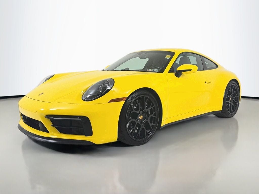 Used 2023 Racing Yellow Porsche Carrera GTS Coupe image 1