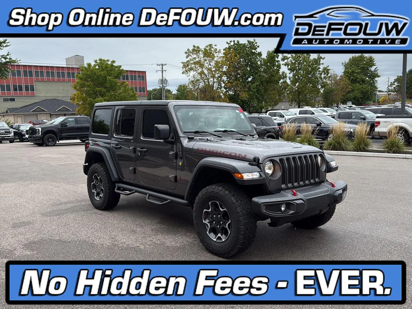 Used 2023 Granite Crystal Metallic Clearcoat Jeep Rubicon image 1