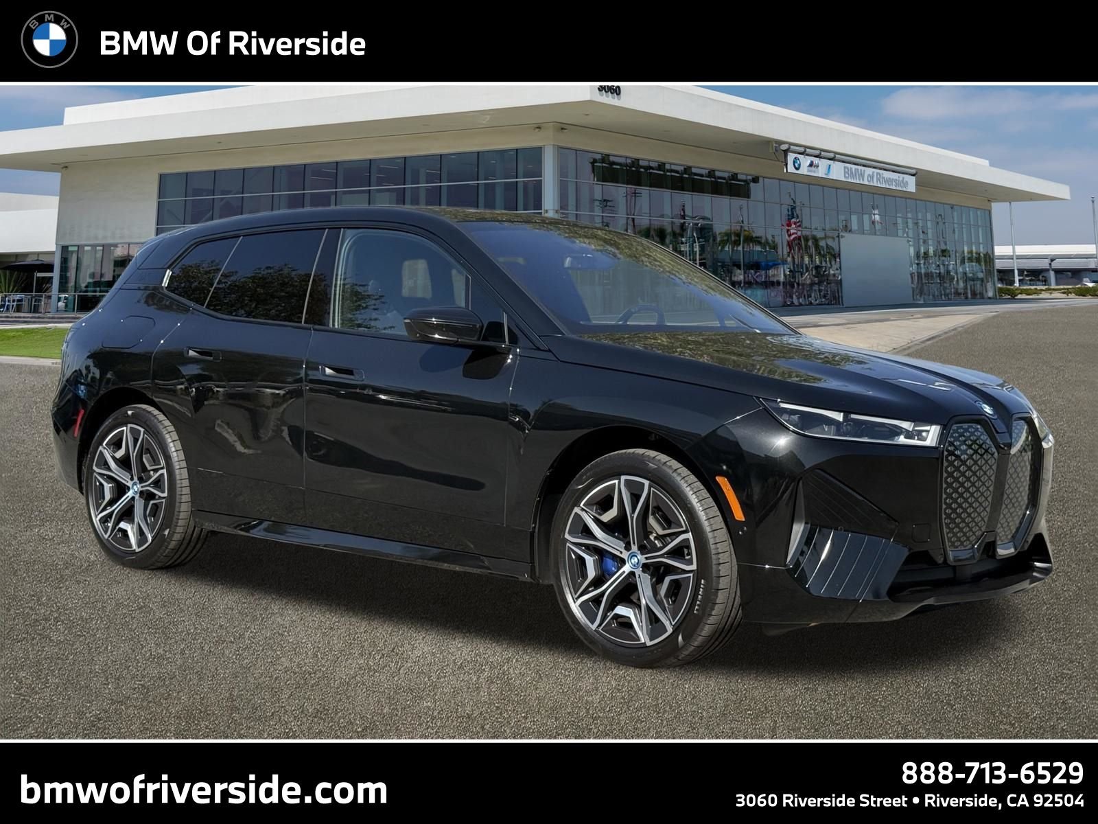 Certified Used 2024 Black BMW xDrive50 image 1