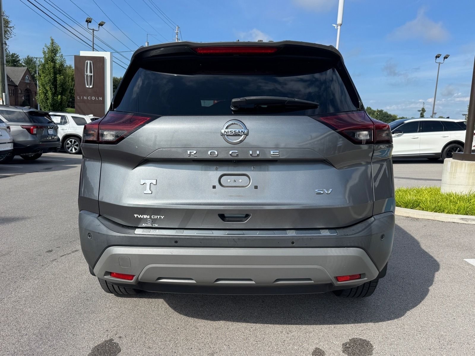 Used 2021 Gun Metallic Nissan SV image 4