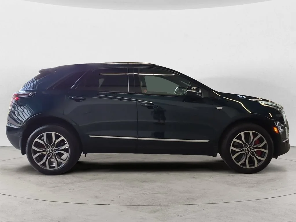 Used 2025 Emerald Lake Metallic Cadillac Sport image 4