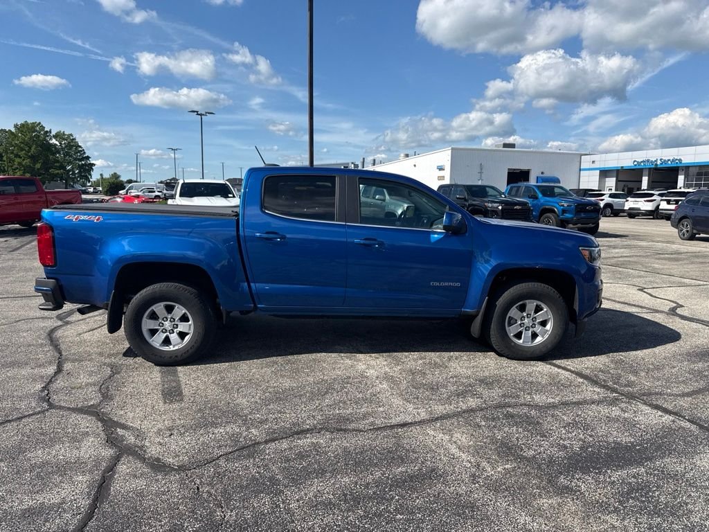Used 2019 KINETIC BLUE METALLIC Chevrolet 4WD Work Truck image 7