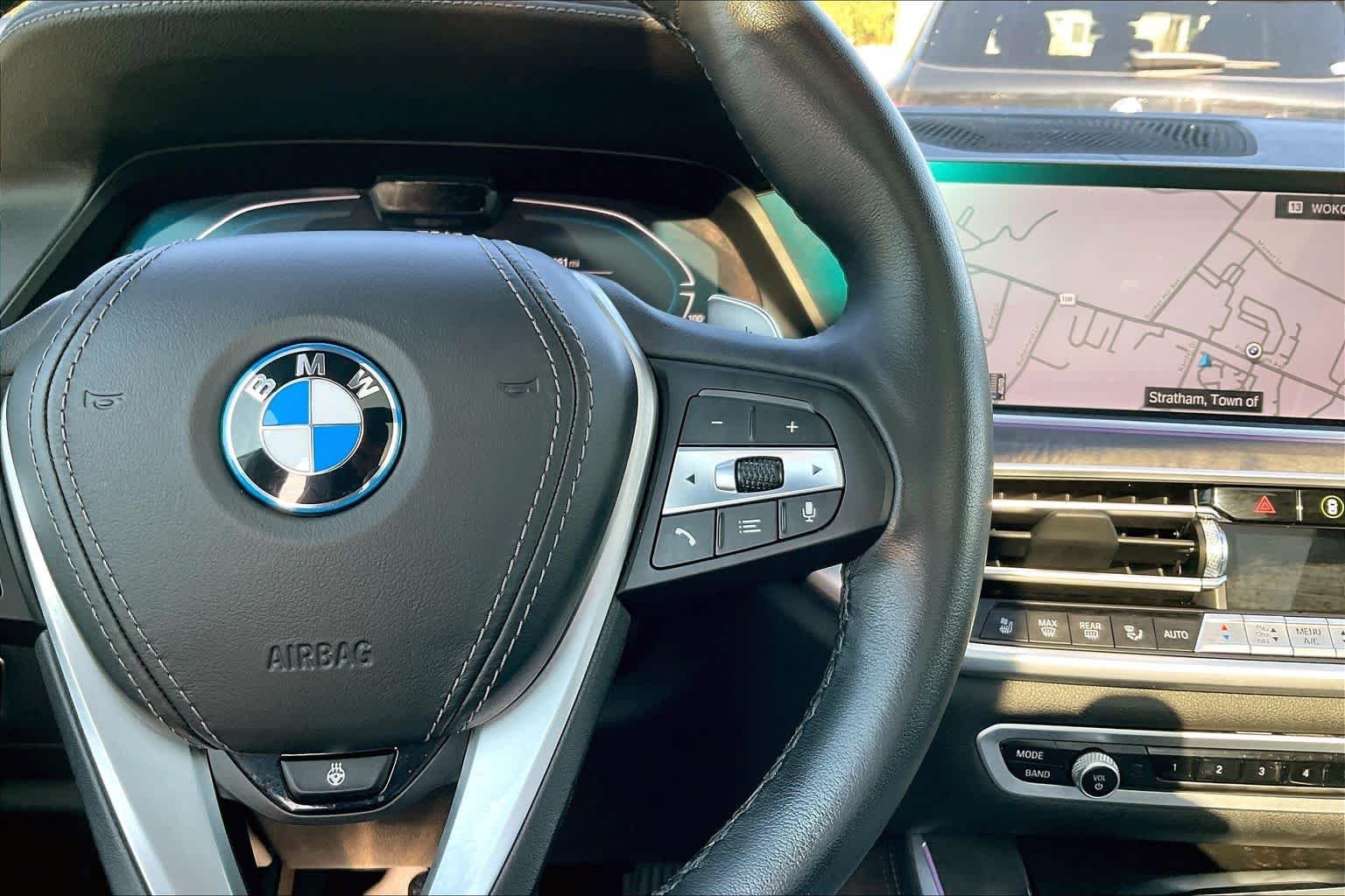 Used 2023 Black Sapphire Metallic BMW xDrive45e image 24