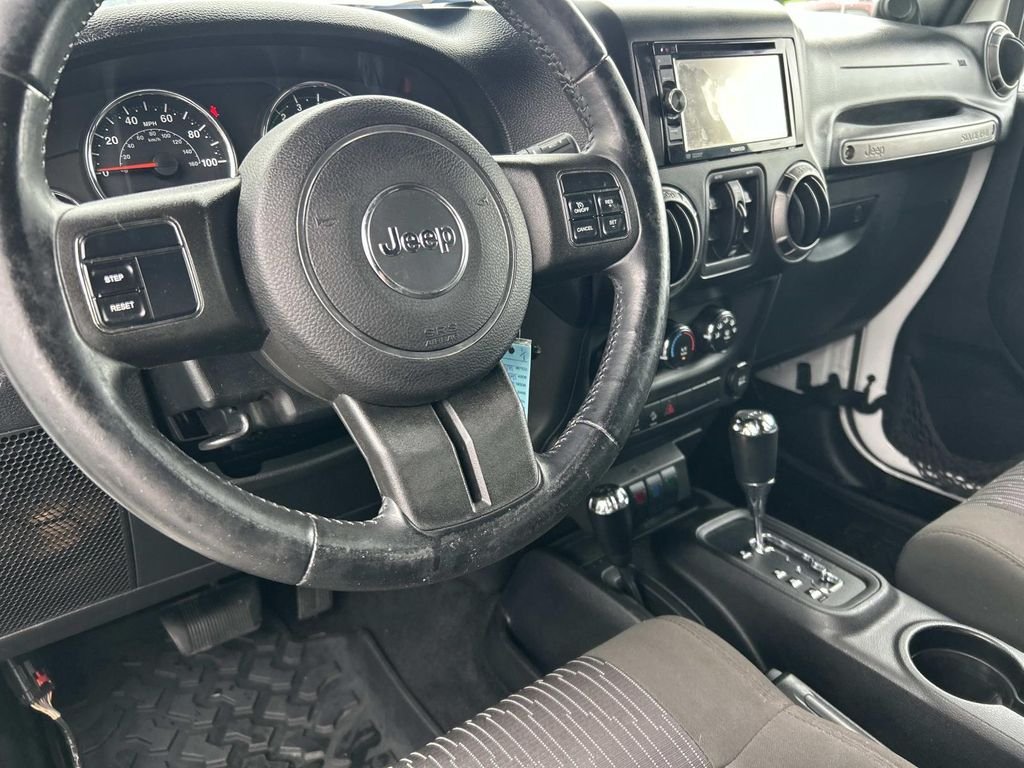 Used 2012 Bright White Jeep Unlimited Sport image 13