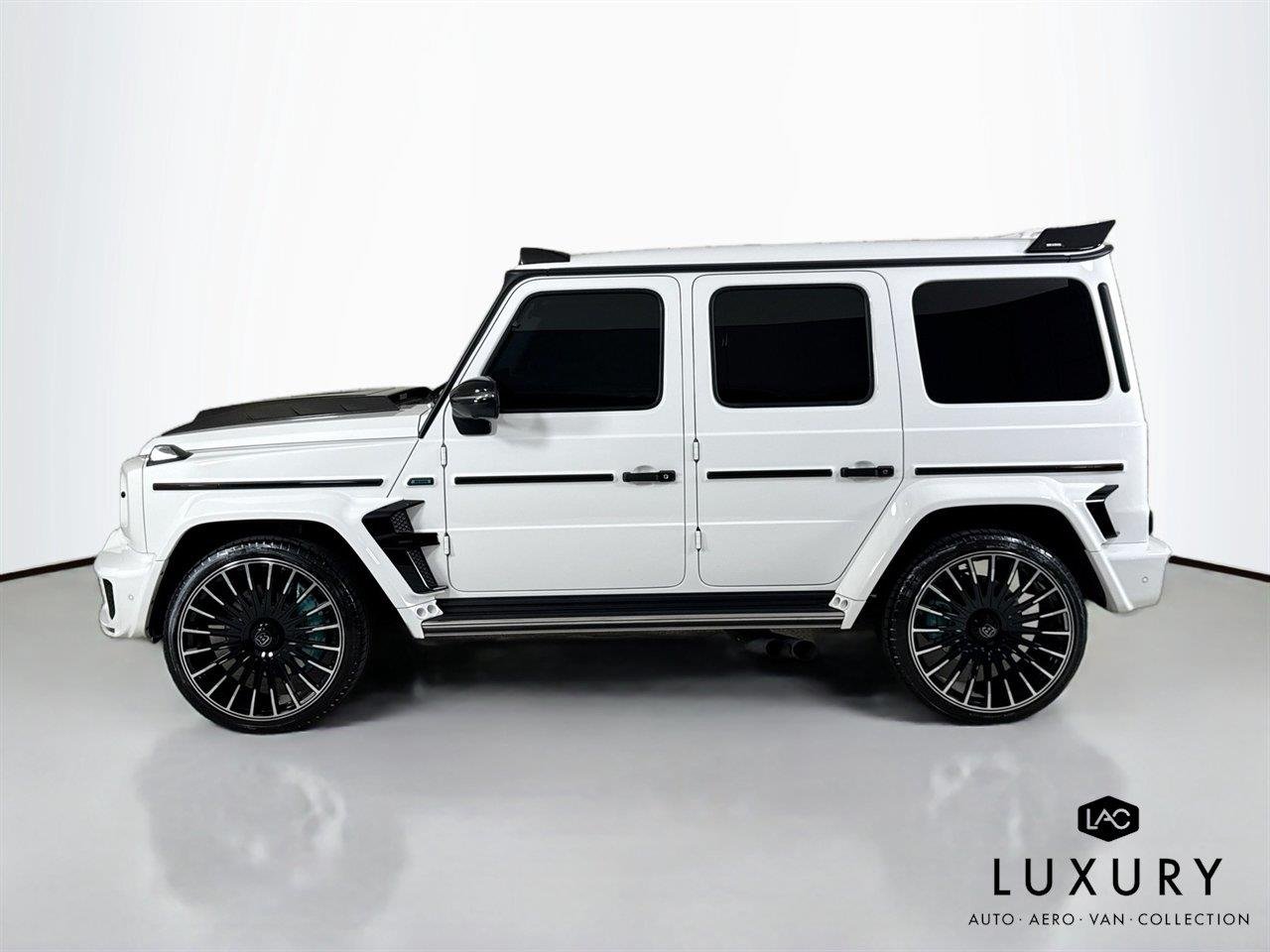 Used 2024 Polar White Mercedes-Benz AMG® G 63  Brabus Custom Widebody / Custom Tiffany Interior image 8