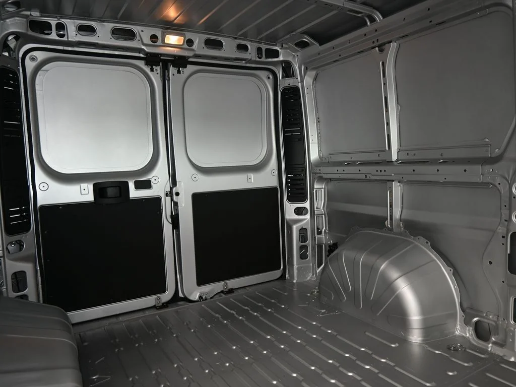 Used 2025 Bright Silver Clearcoat Metallic Ram Low Roof image 31