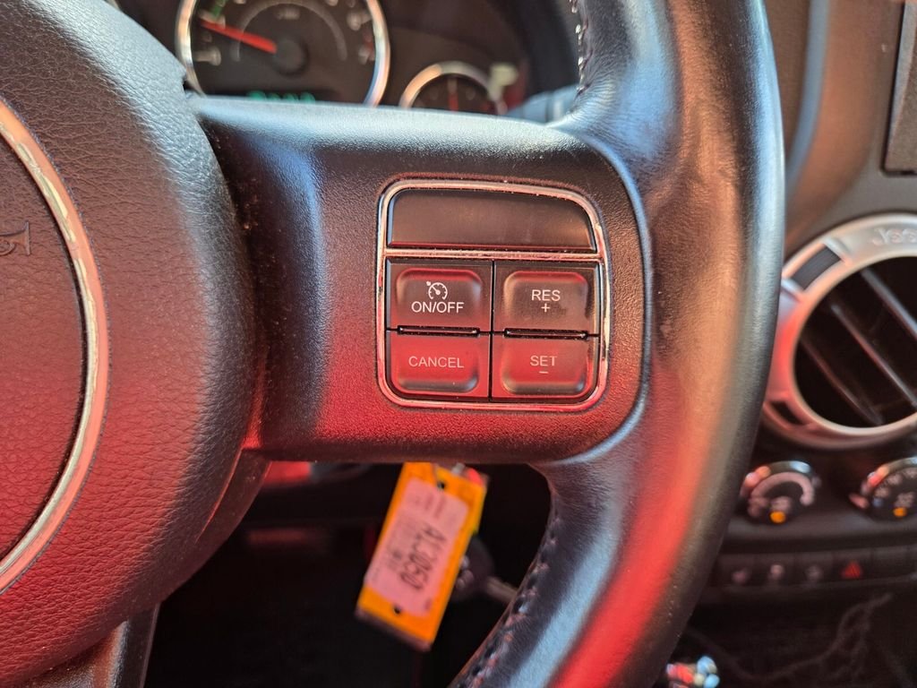 Used 2015 Red Jeep Unlimited Sahara image 29