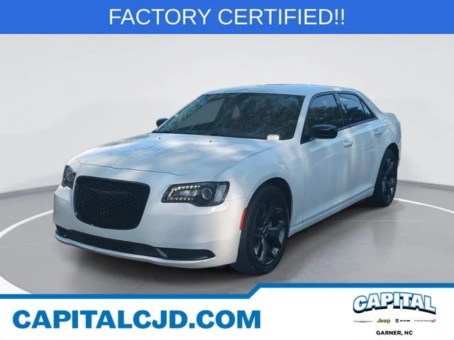 Used 2023 White Chrysler Touring image 1