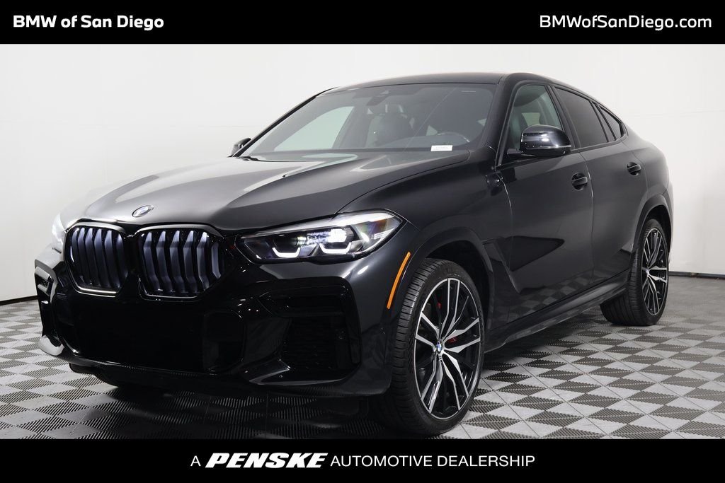 Used 2022 Black Sapphire Metallic BMW xDrive40i image 1