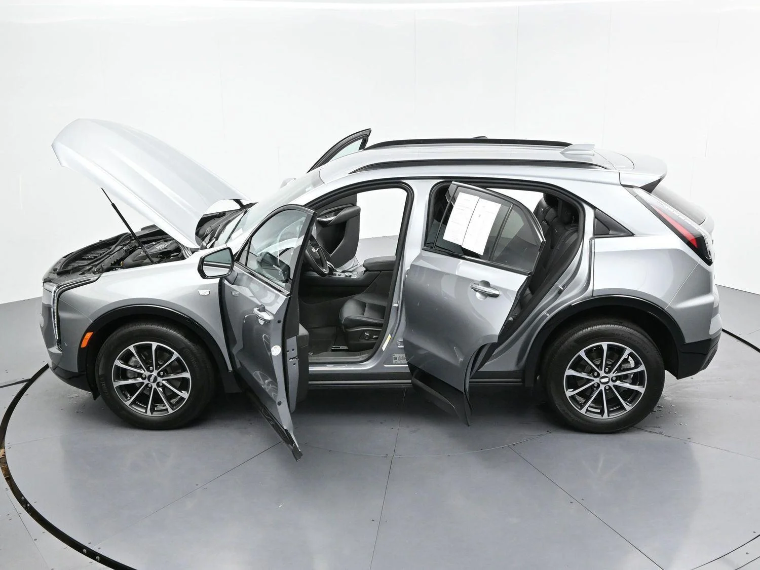 Used 2024 Argent Silver Metallic Cadillac Sport image 38