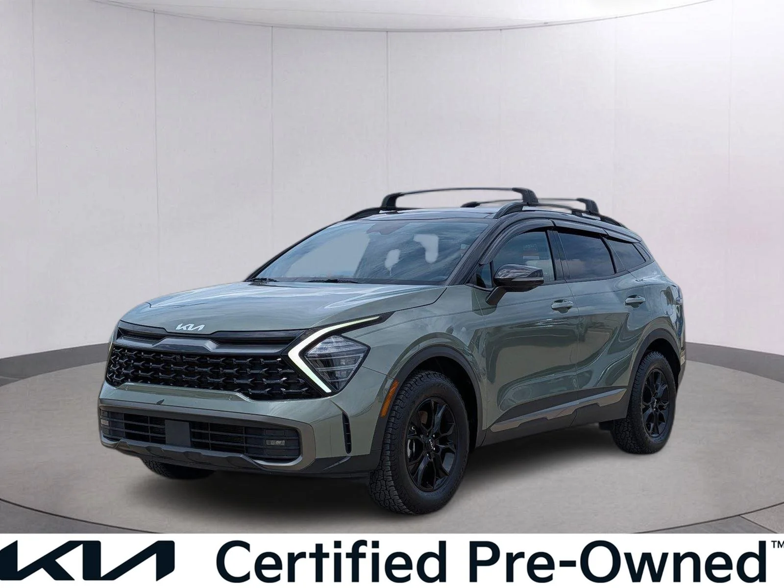 Used 2024 Jungle Green/Ebony Black Roof Kia X-Pro Prestige image 1