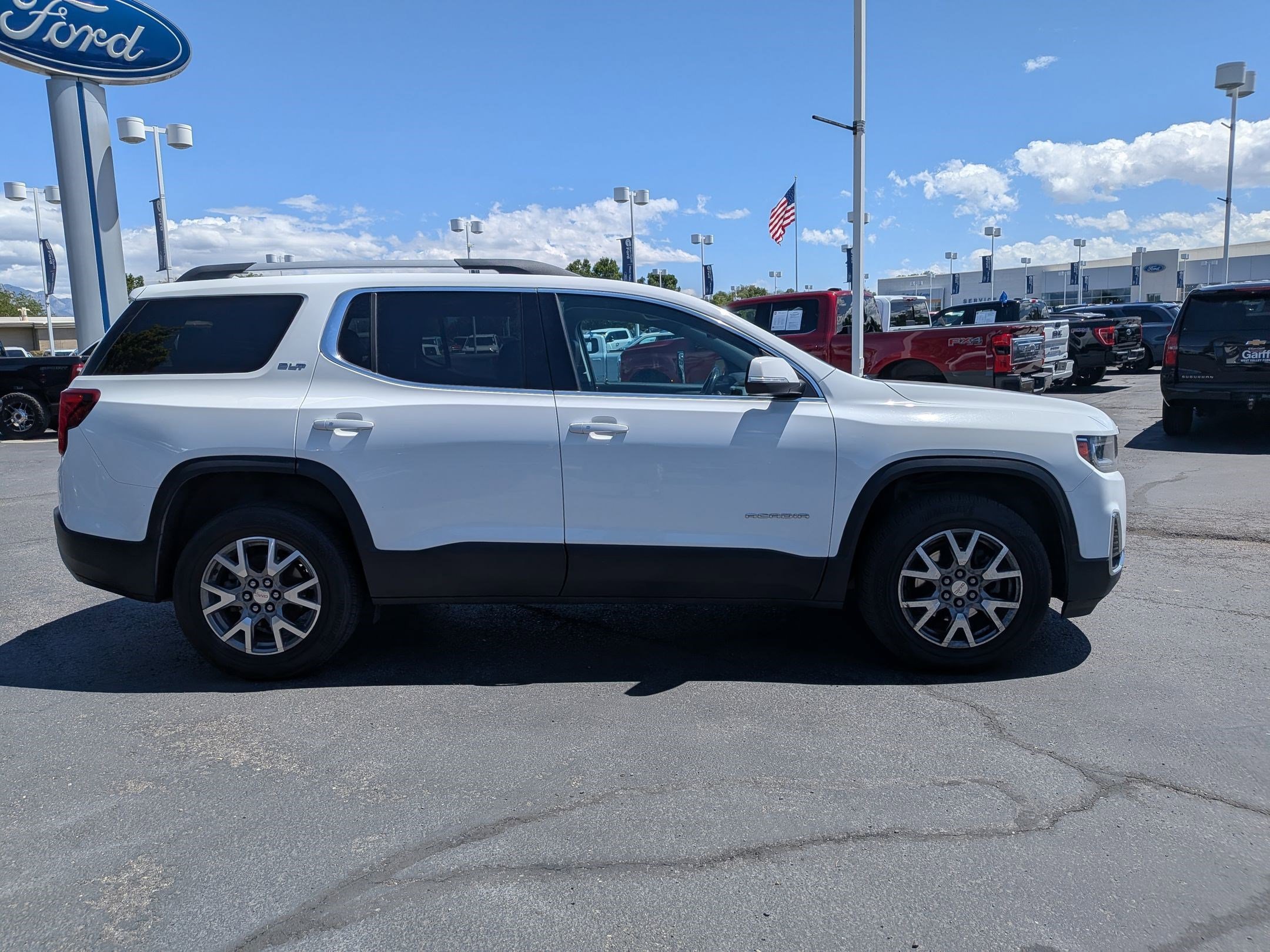 Used 2020 GMC Acadia SLT with VIN 1GKKNUL40LZ197028 for sale in West Valley City, UT