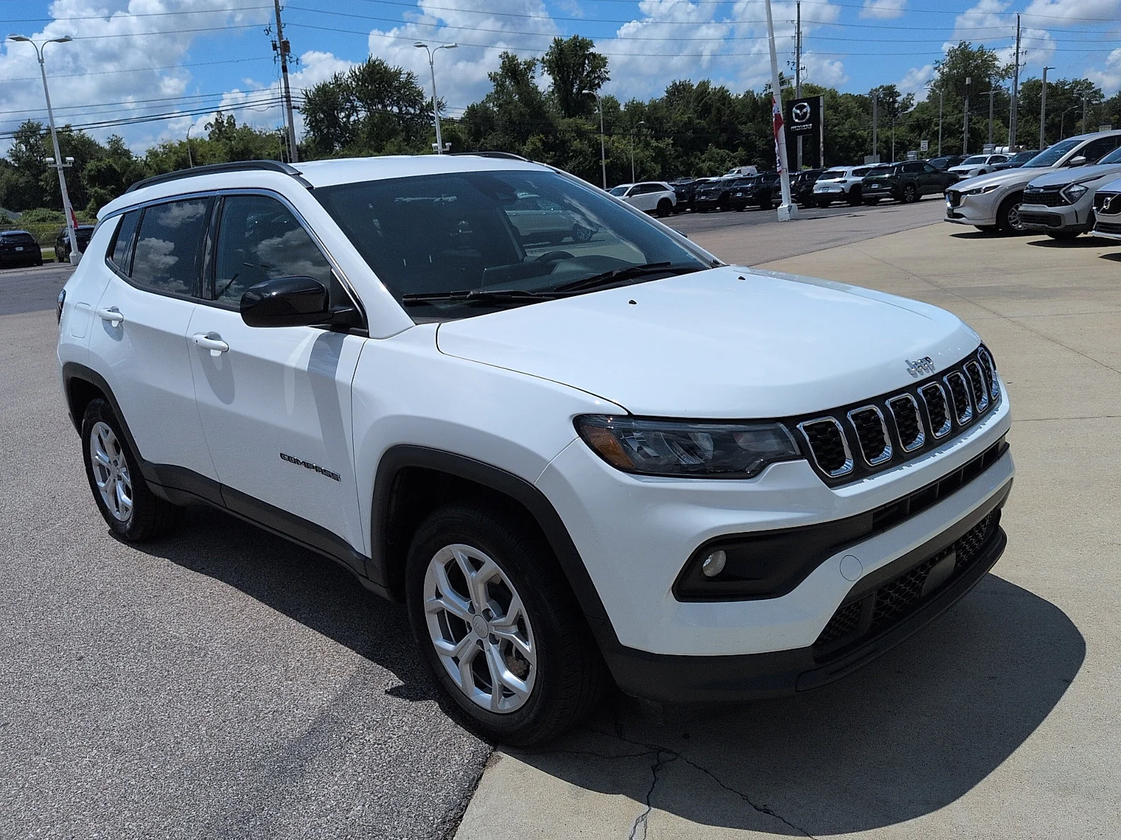 Used 2024 Bright White Clearcoat Jeep Latitude image 1