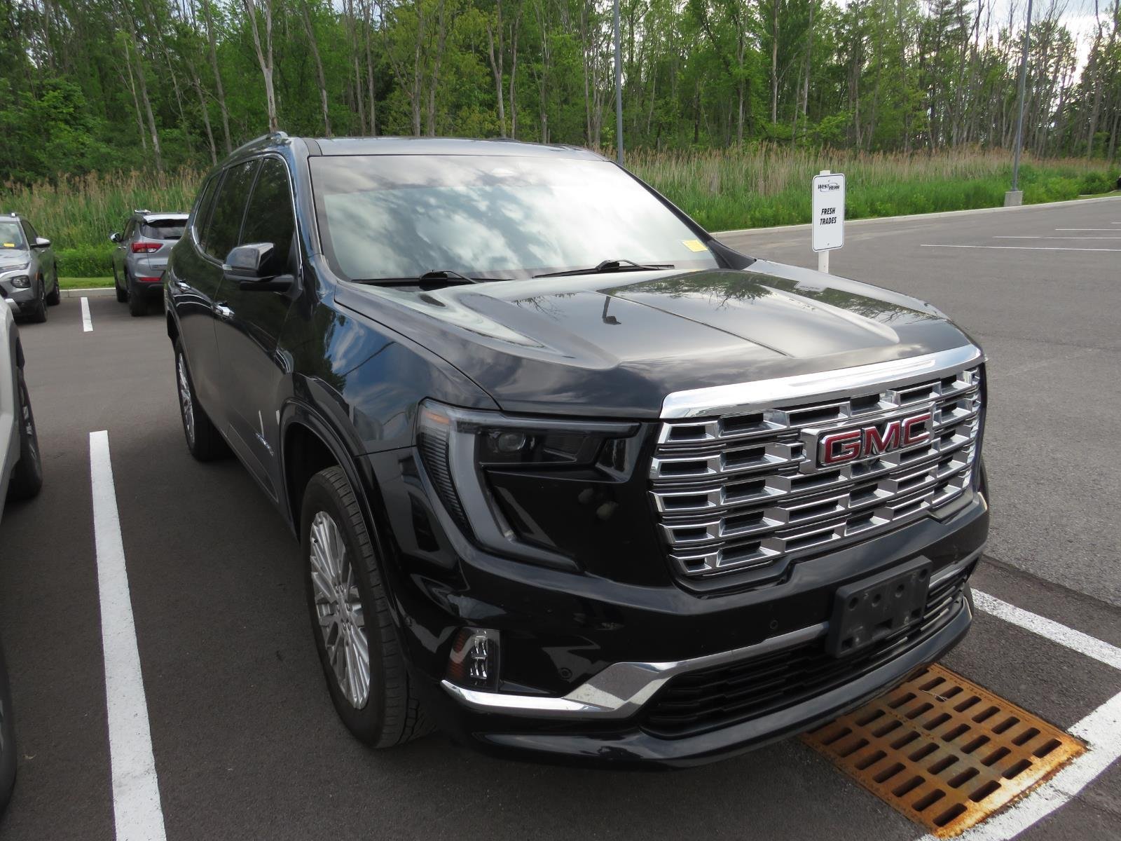 Used 2024 EBONY TWILIGHT METALLIC GMC  image 2