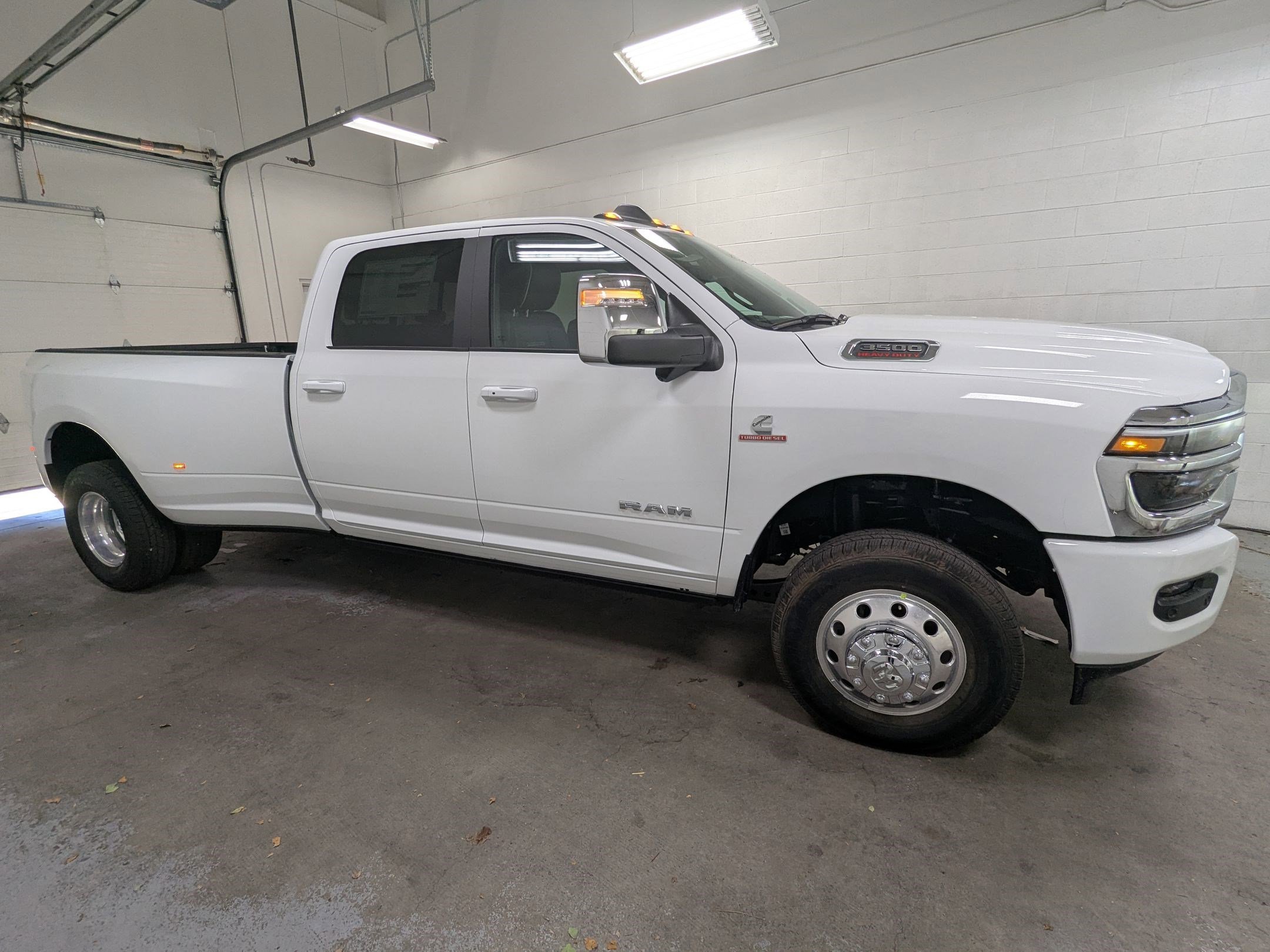 New 2026 Bright White Clear-Coat Exterior Paint RAM Laramie image 3