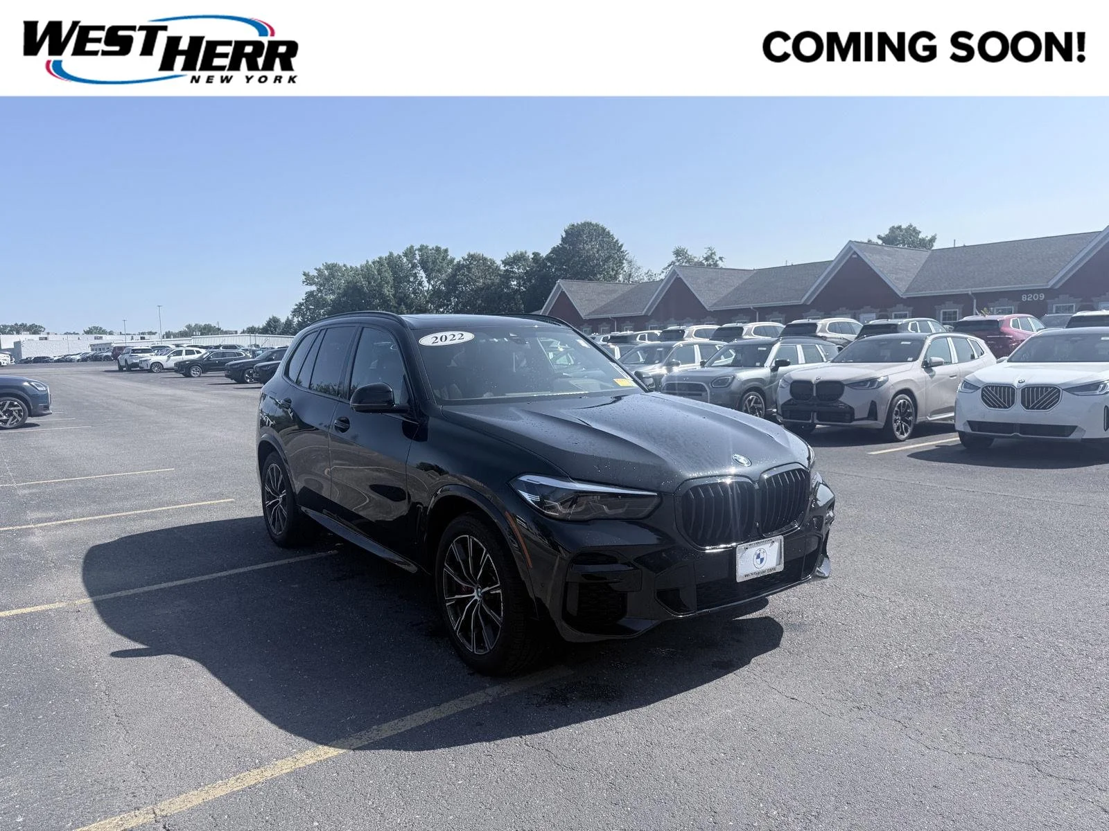 Used 2022 Black Sapphire Metallic BMW M50i image 1