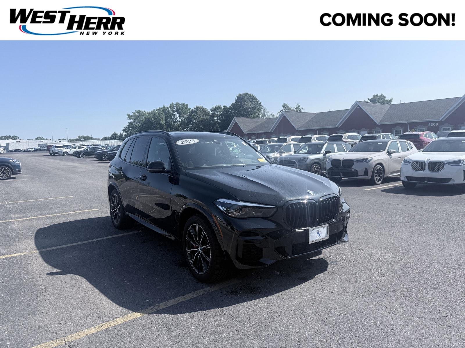 Used 2022 Black Sapphire Metallic BMW M50i image 1