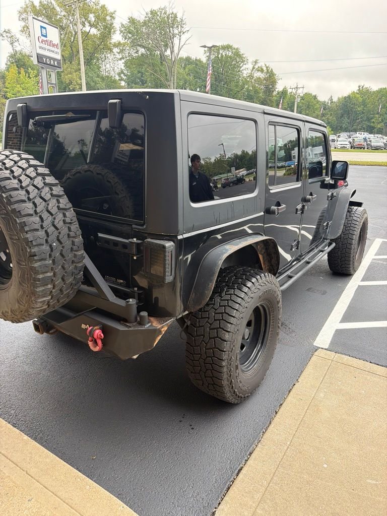 Used 2011 Black Jeep Unlimited Rubicon image 4