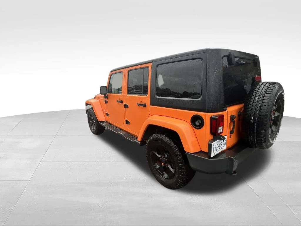 Used 2013 Orange Jeep Unlimited Sahara image 10