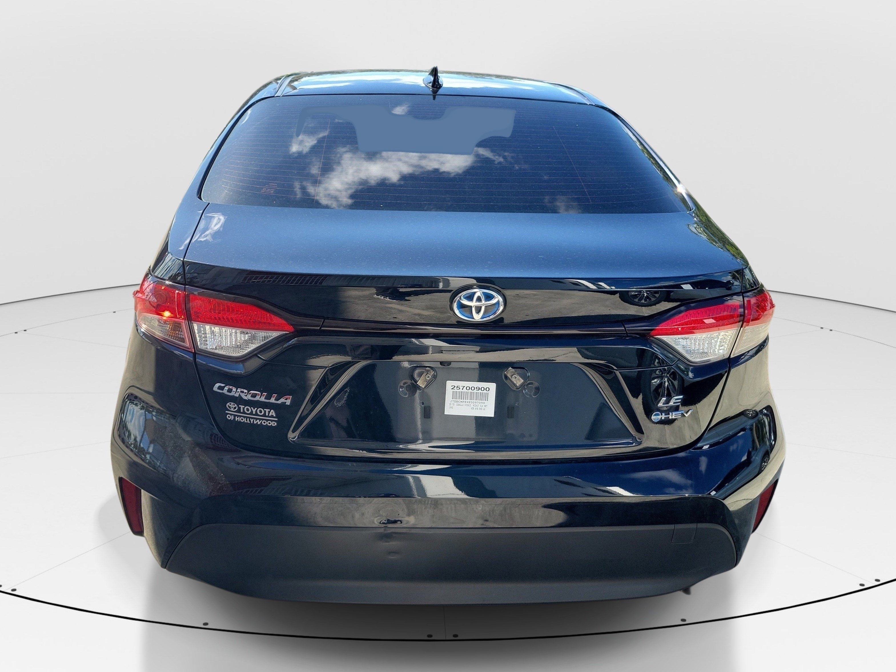 Used 2025 Midnight Black Metallic Toyota Hybrid LE image 6