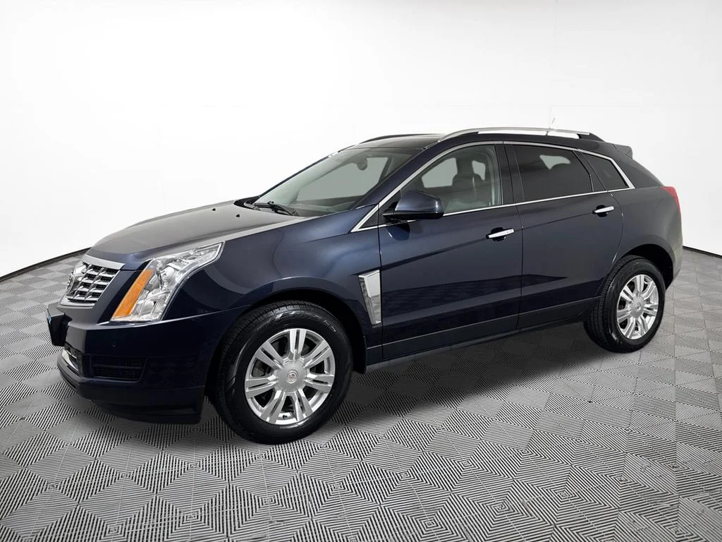 Used 2014 Cadillac SRX Luxury Collection with VIN 3GYFNBE34ES628857 for sale in Chippewa Falls, WI