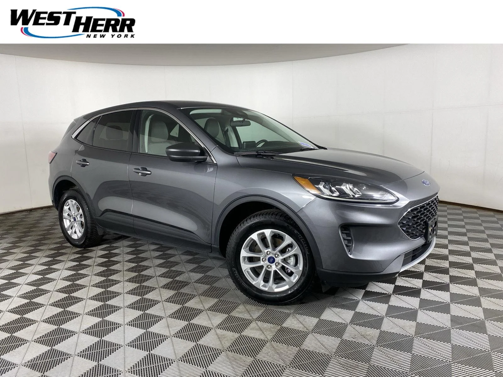 Used 2022 Carbonized Gray Ford SE image 1