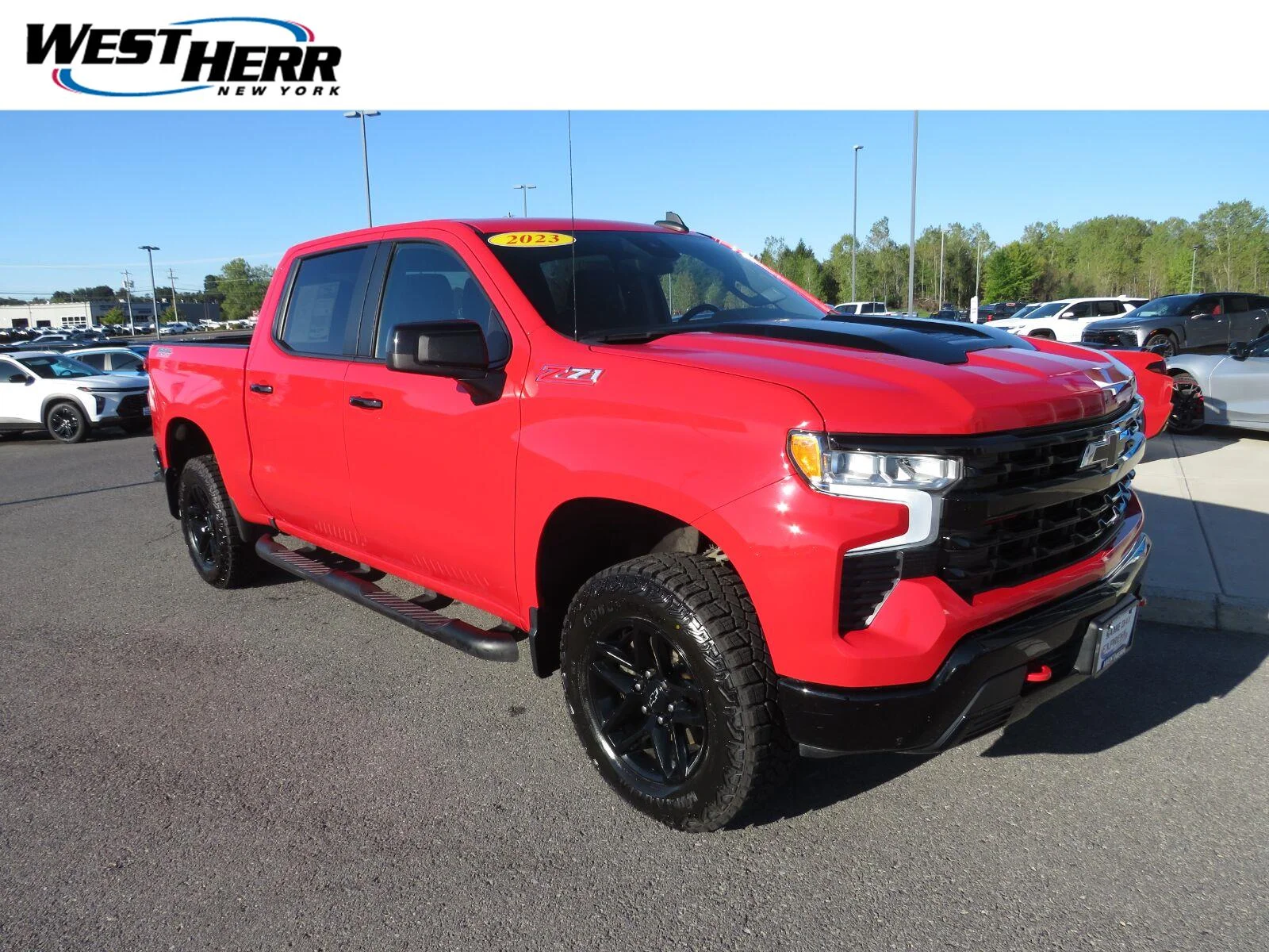 Used 2023 RED HOT Chevrolet LT Trail Boss image 1
