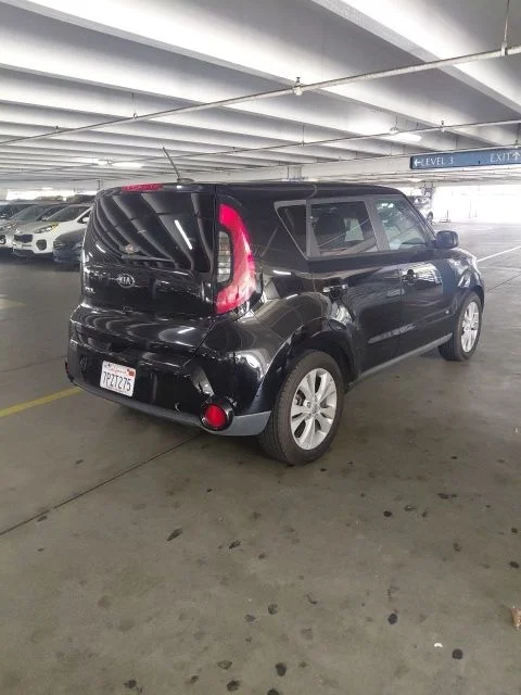 Used 2016 Black Kia Plus image 4