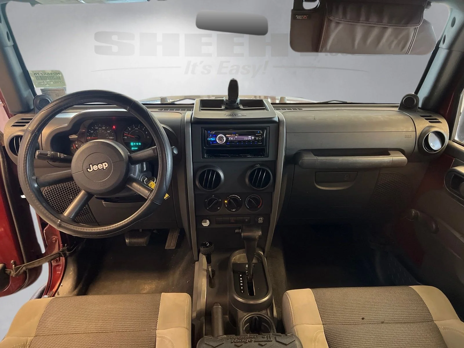 Used 2007 Red Rock Crystal Pearlcoat Jeep Unlimited X image 3
