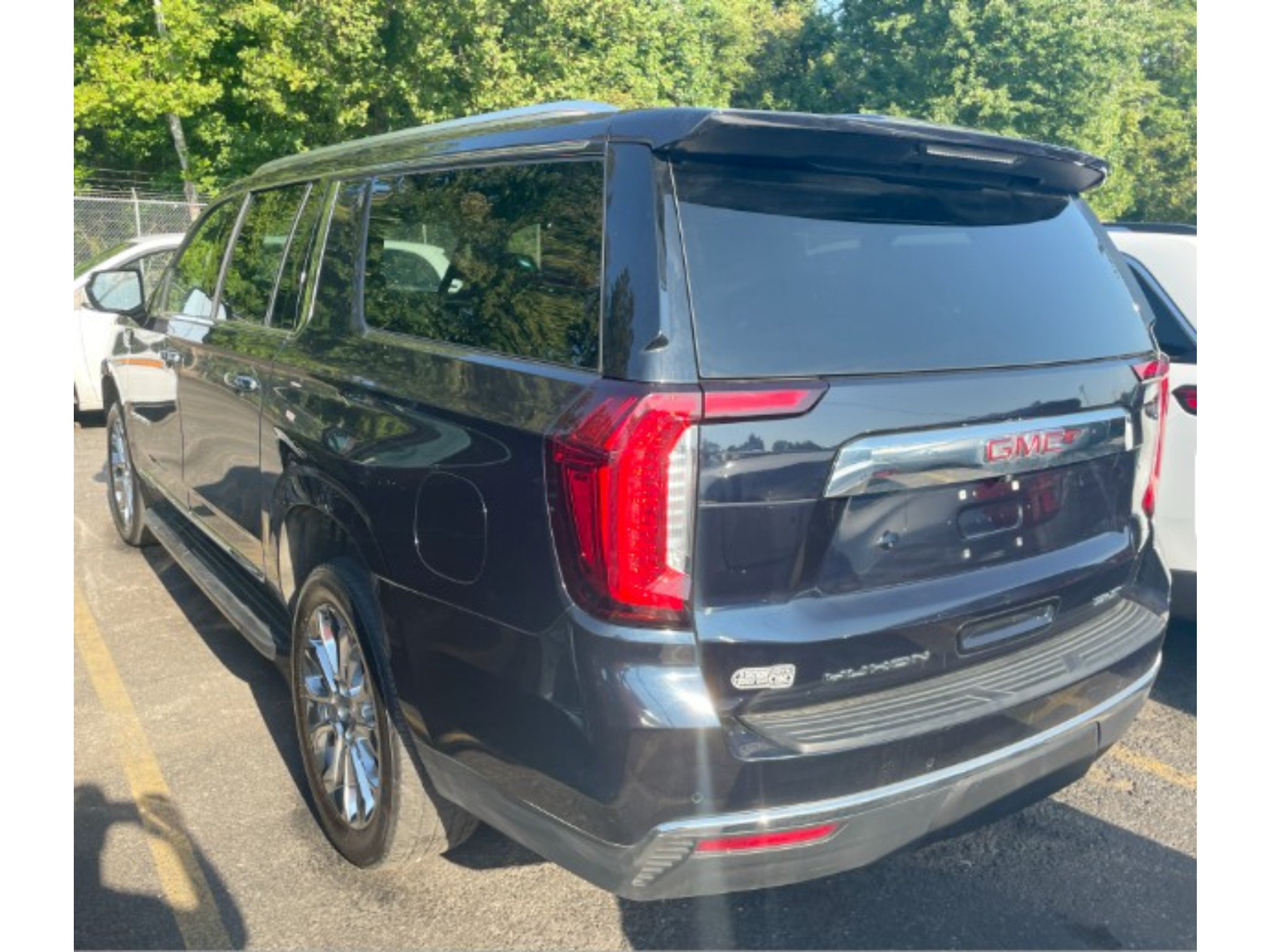 Used 2023 Midnight Blue Metallic GMC SLT image 4