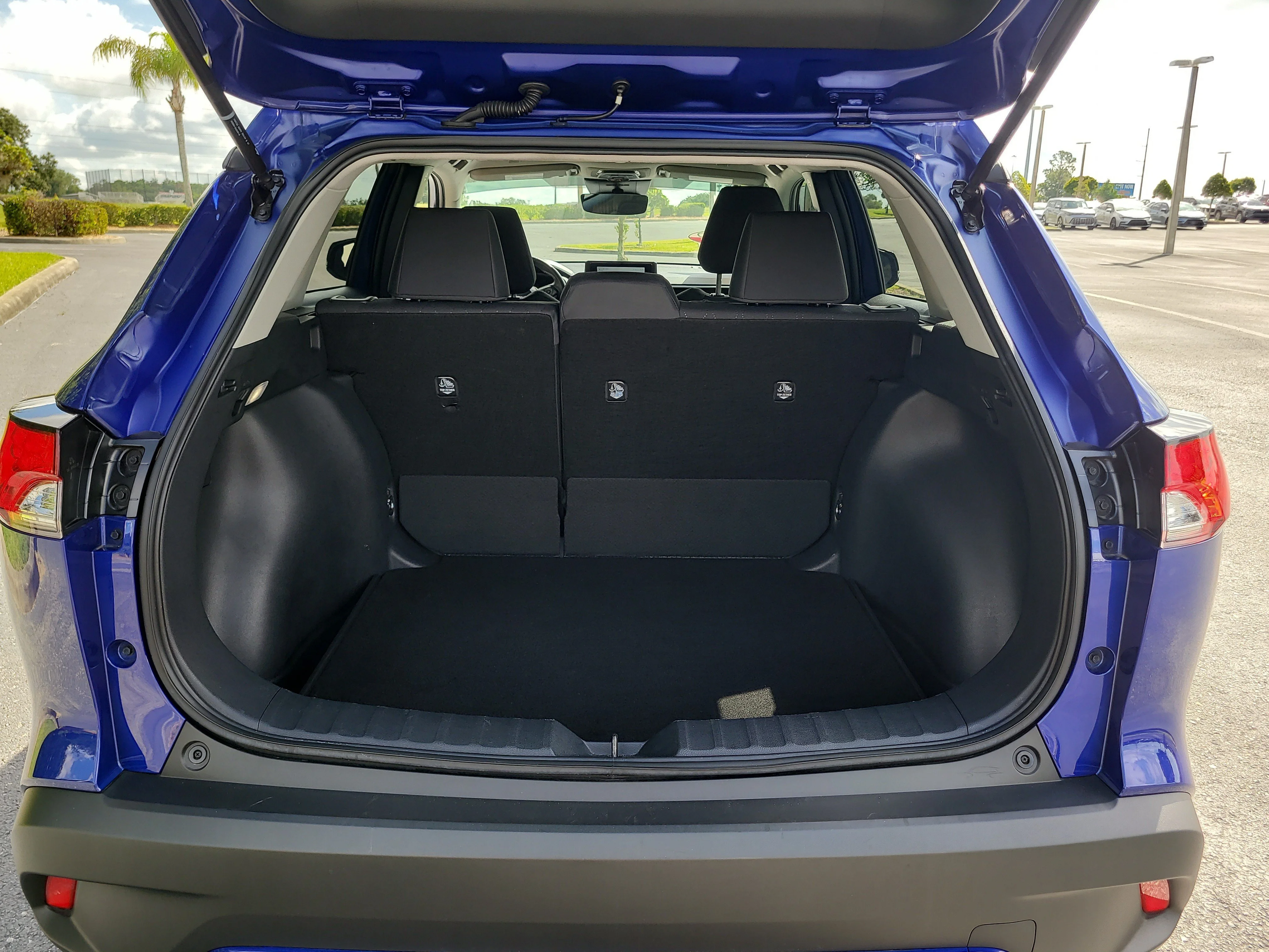Used 2025 Blue Crush Metallic Toyota LE image 10
