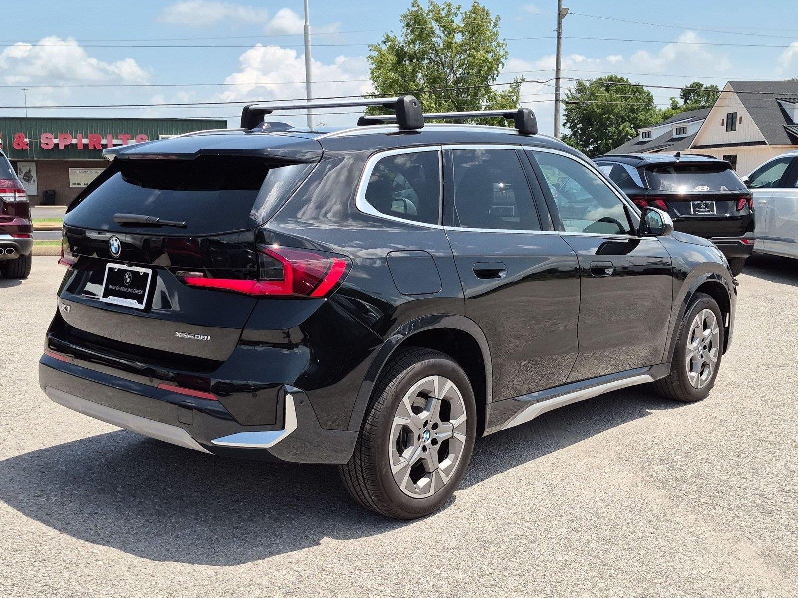 Used 2024 Black Sapphire Metallic BMW xDrive28i image 5