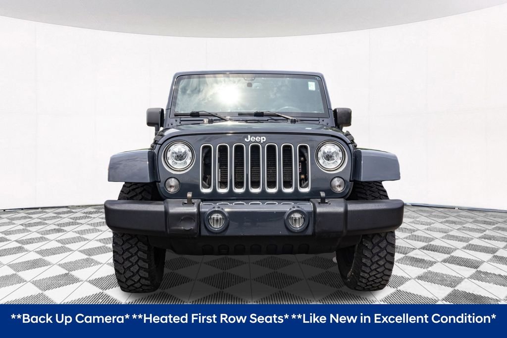 Used 2017 Black Jeep Unlimited Sahara image 5