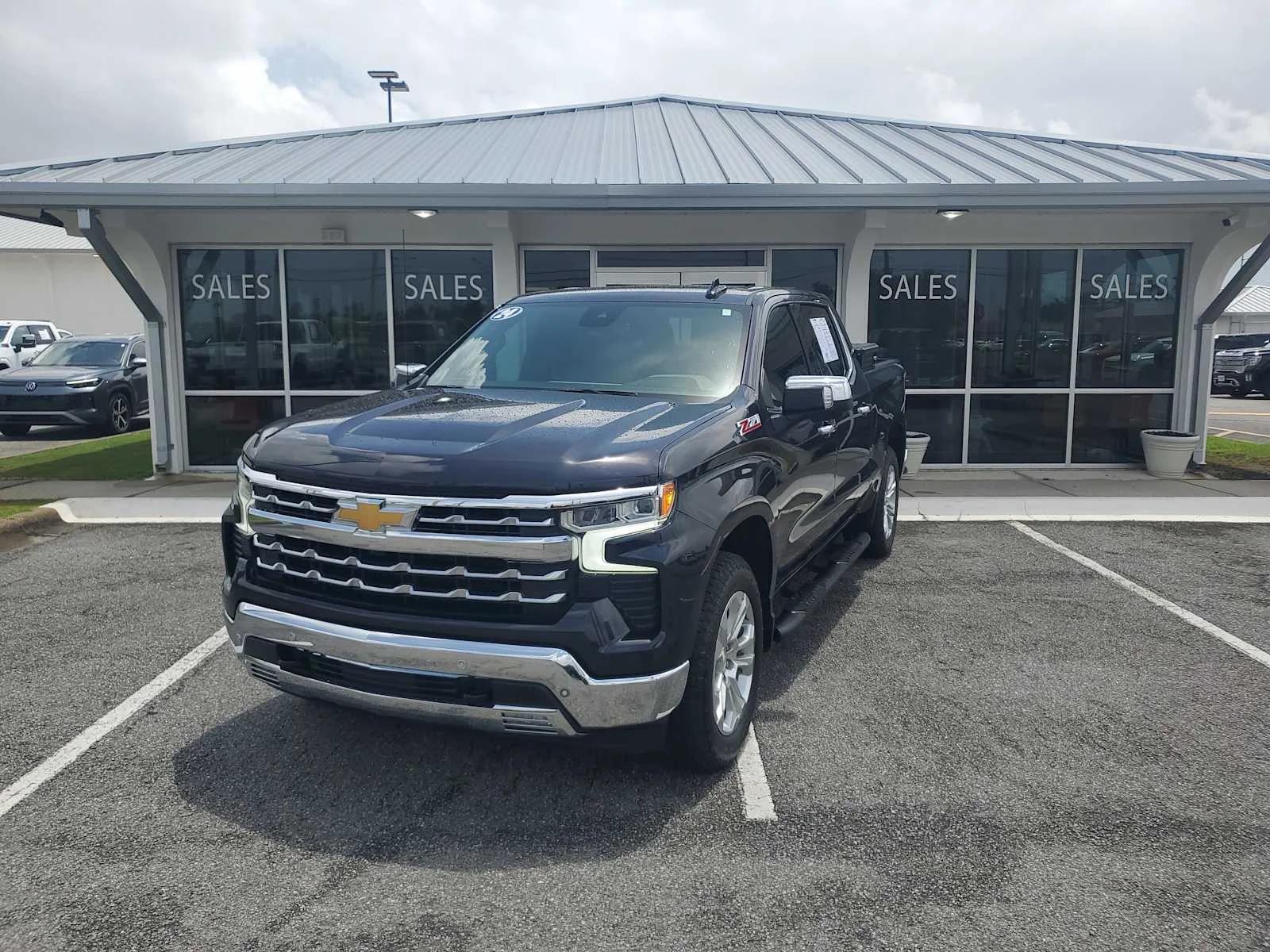 Used 2024 Dark Ash Metallic Chevrolet LTZ image 1