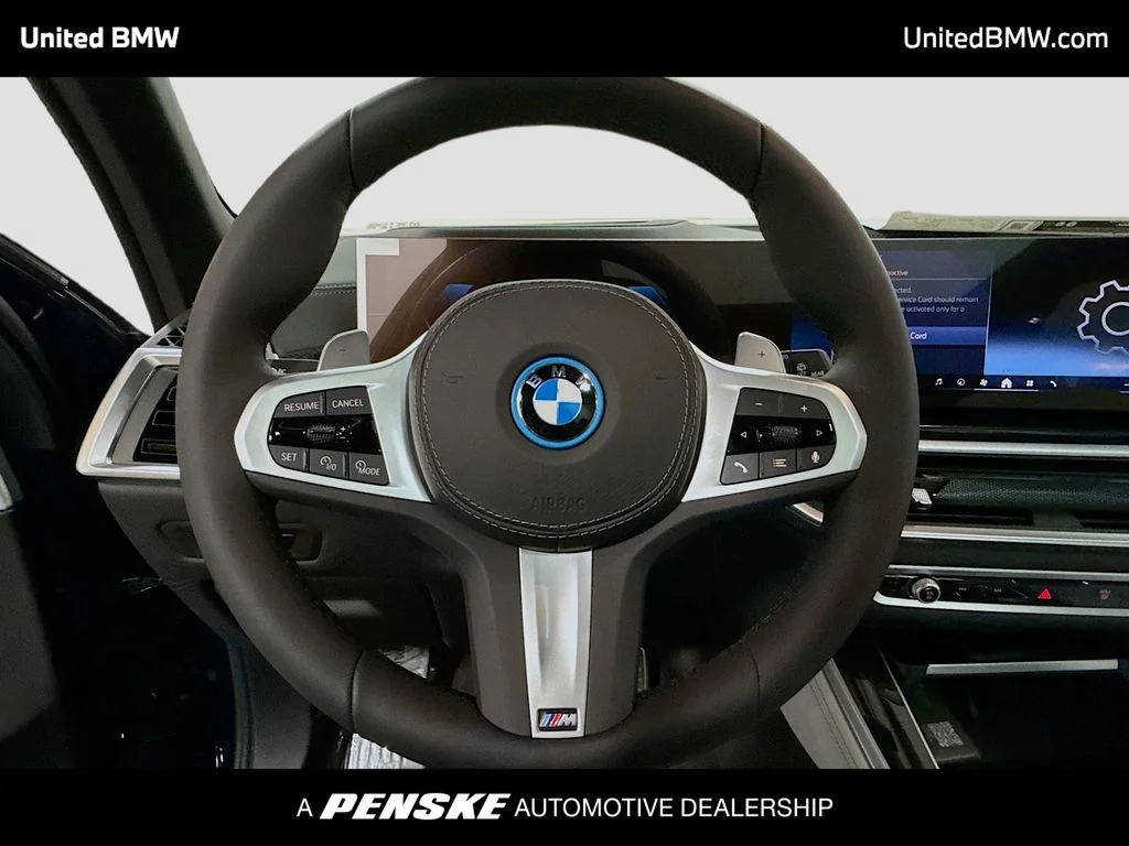 New 2026 Tanzanite Blue II Metallic BMW xDrive50e image 6