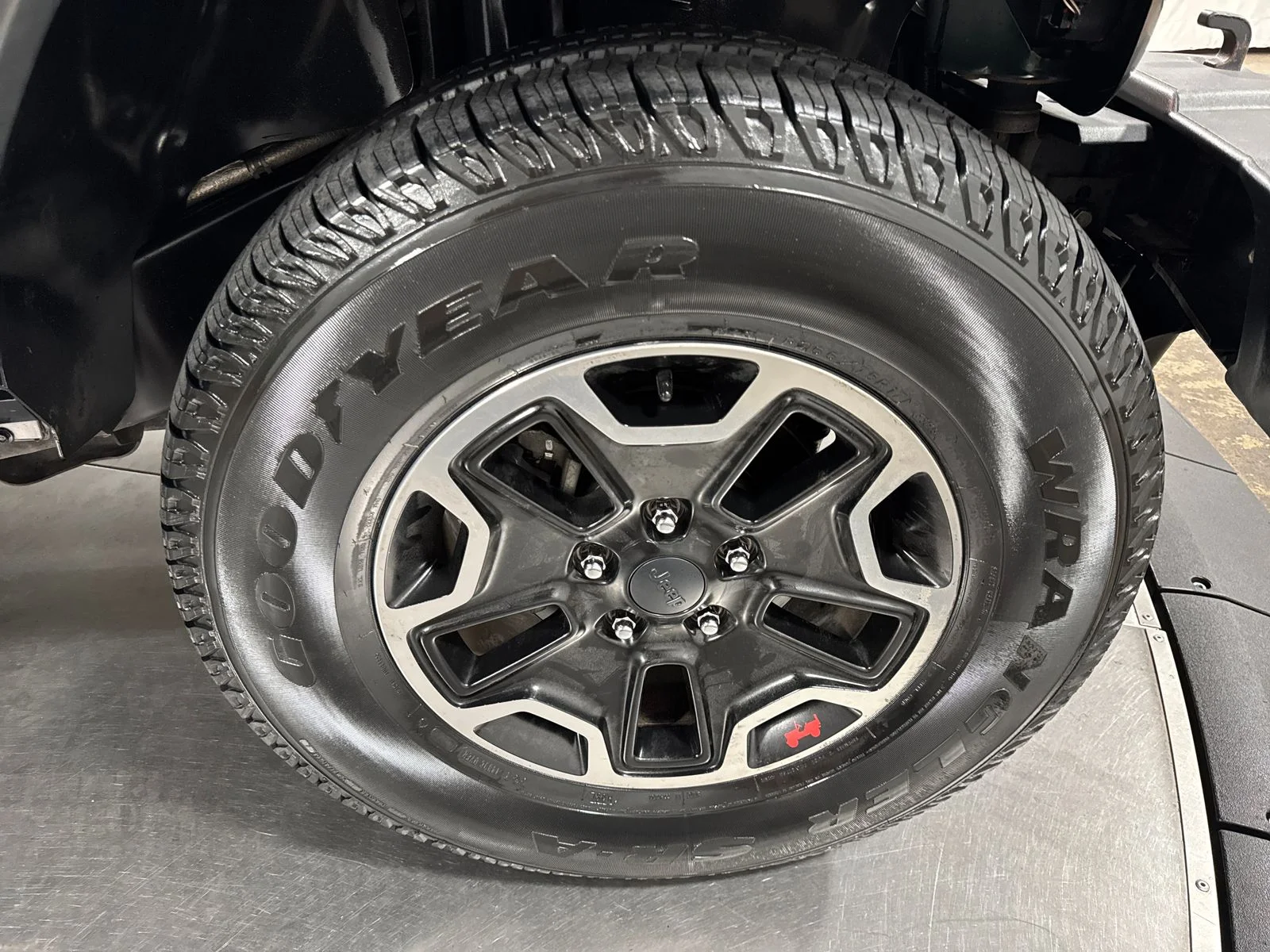 Used 2012 Black / Forest Green Jeep Sport image 14