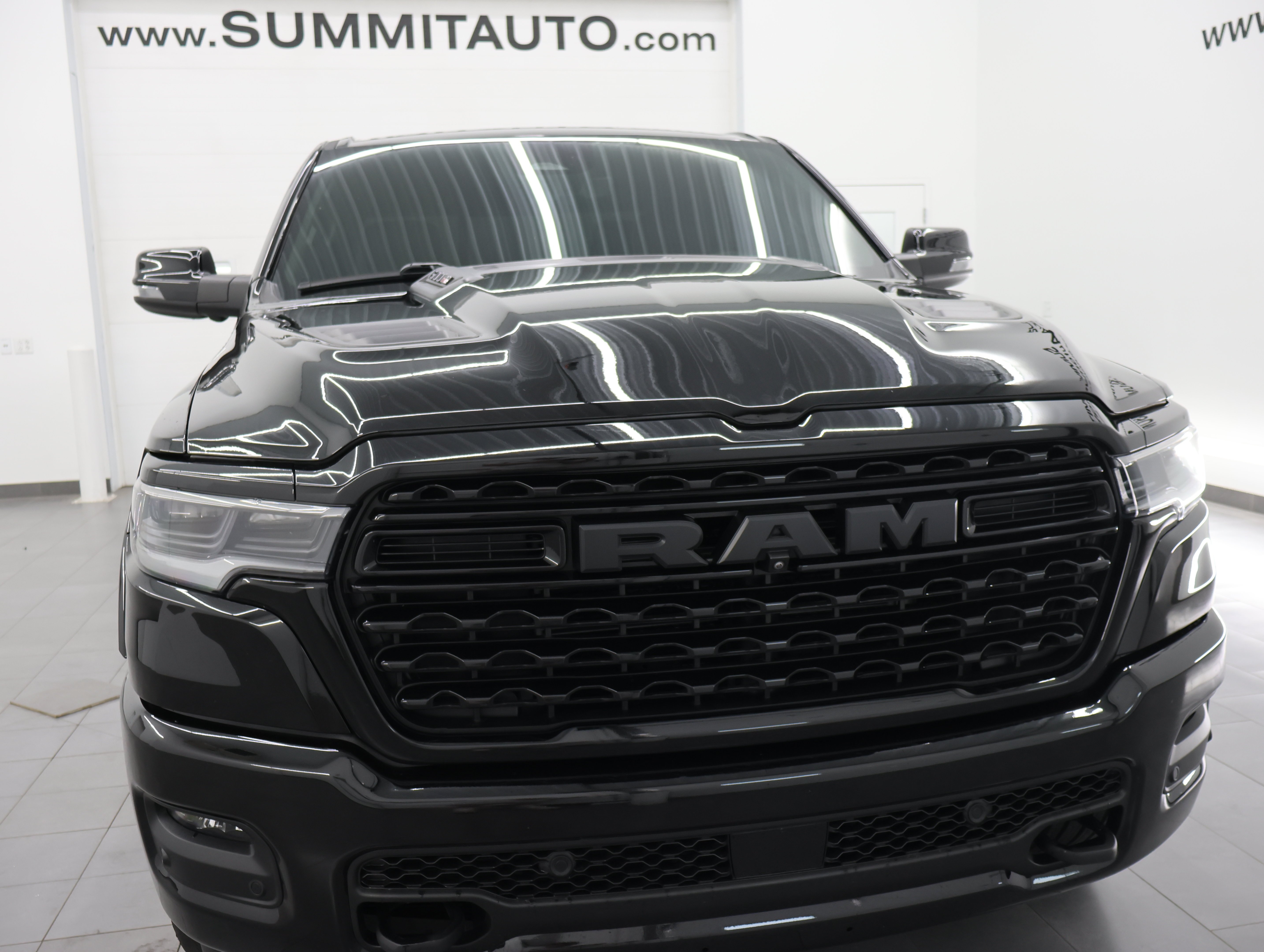 Used 2025 Diamond Black Crystal Pearlcoat Ram Limited image 22