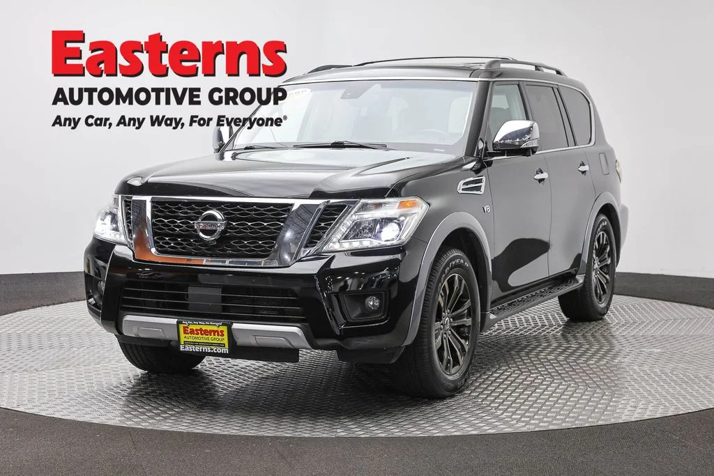 Used 2017 Black Nissan Platinum image 1