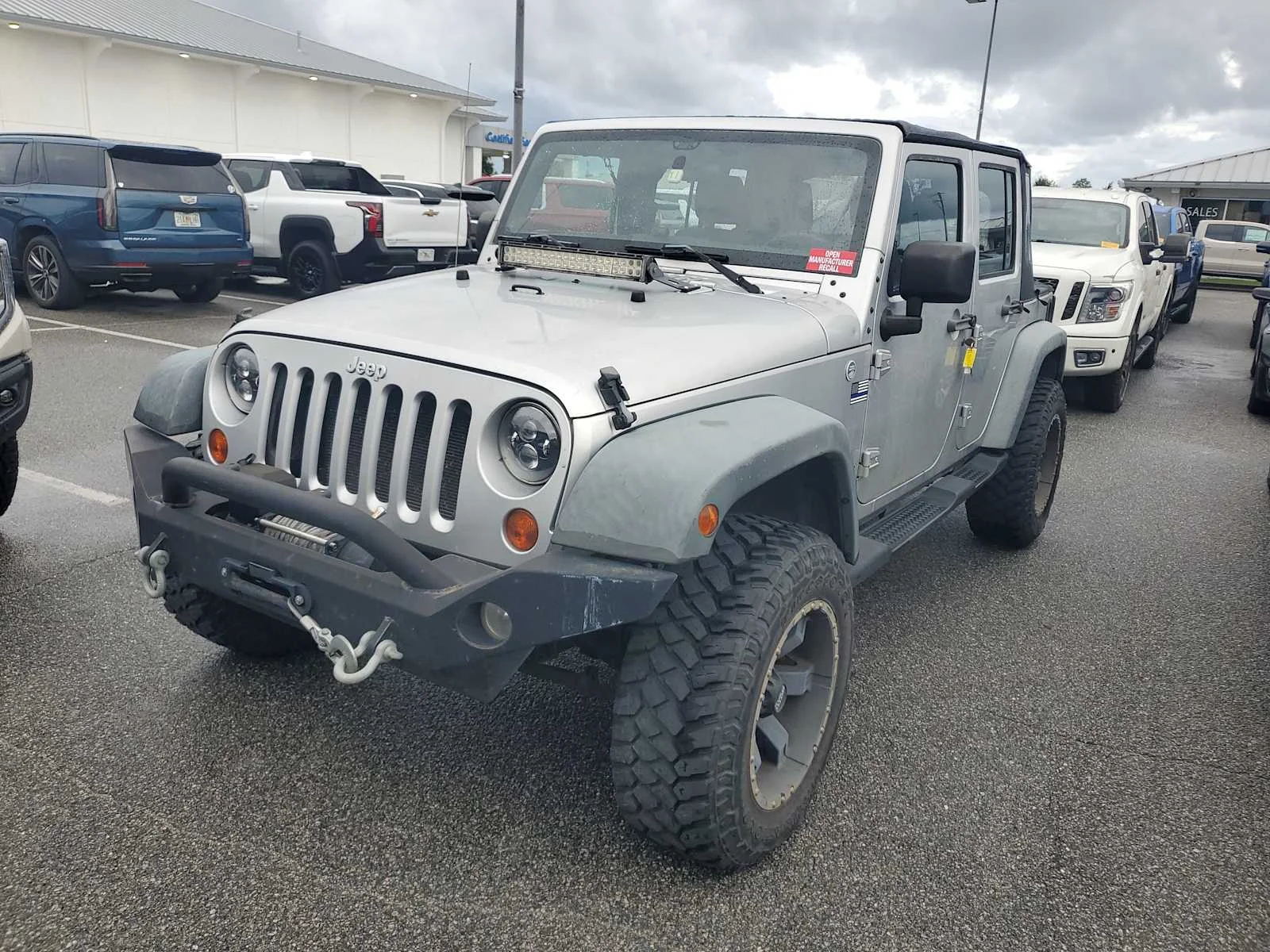 Used 2011 Bright Silver Metallic C Jeep Sport image 1