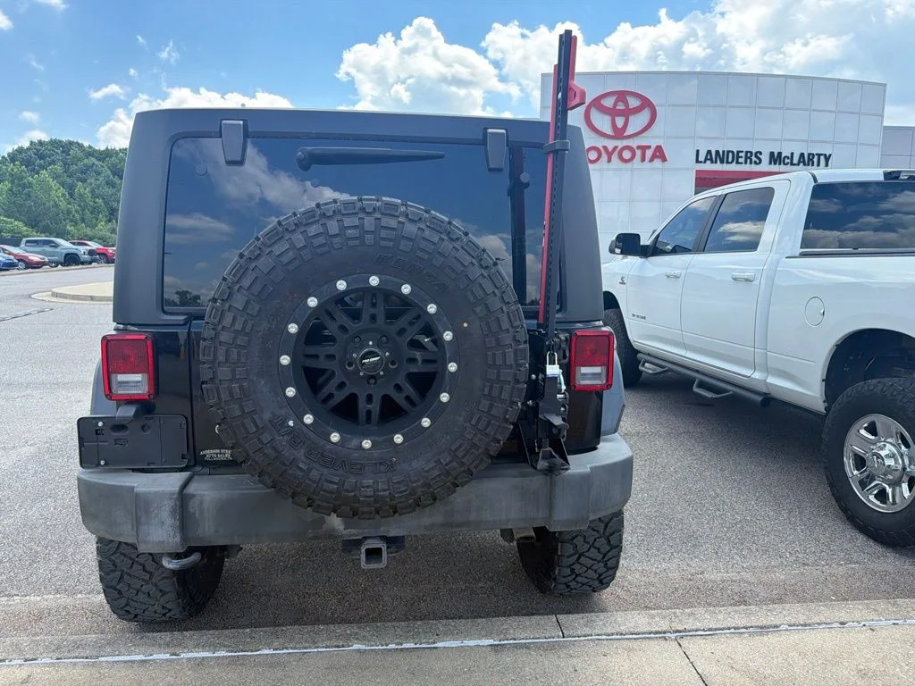 Used 2015 Black Jeep Unlimited Sport image 8