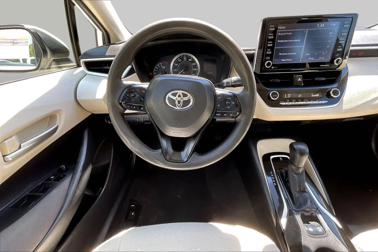 Used 2021 Super White Toyota LE image 6