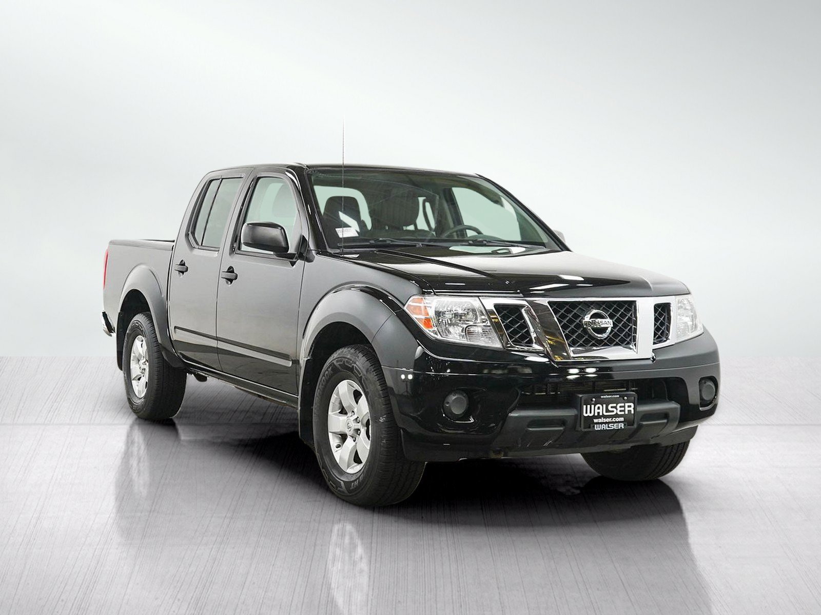 Used 2012 Super Black Metallic Nissan SV image 7